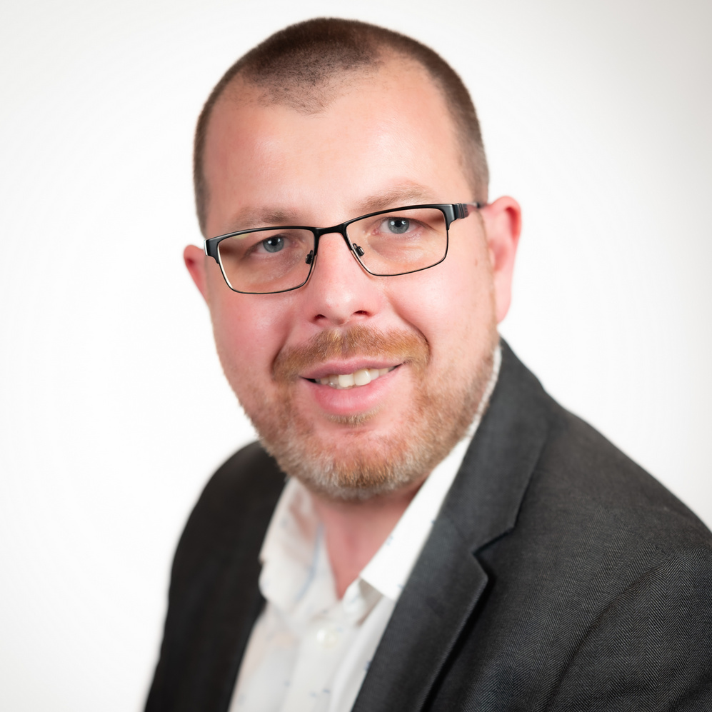 Man in glasses in a suit